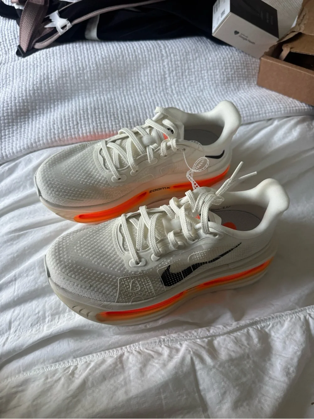 Nike White Athletic Shoes with Black Swoosh and Orange Accent Men 5.5/Women 7